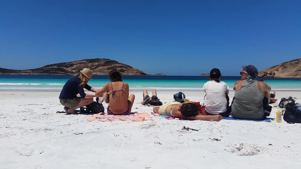 Passengers on the beach at Cape Le Grand on Esperance tours