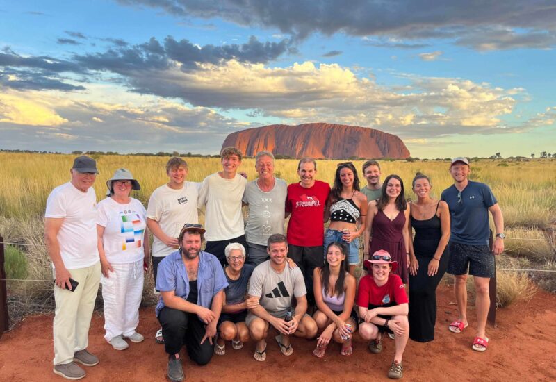 diverse and happy travellers on an Uluru tour by Untamed Escapes